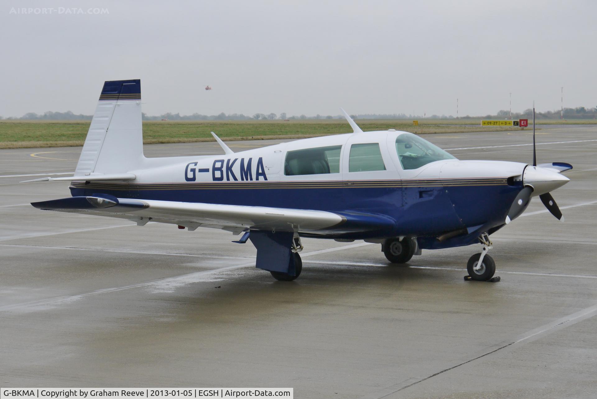 G-BKMA, 1982 Mooney M20J 201 C/N 24-1316, Parked at Norwich.