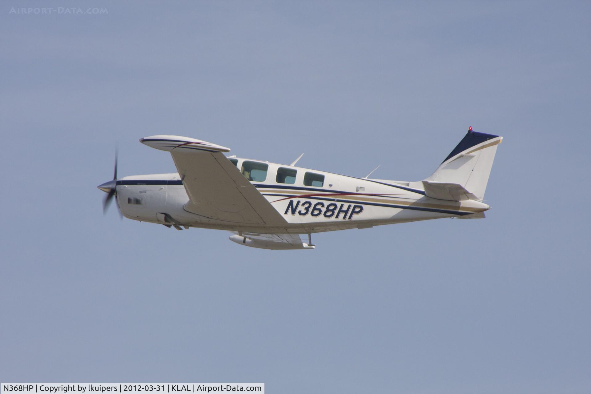 N368HP, 1981 Beech A36 Bonanza 36 C/N E-1833, Leaving Sun 'n Fun 2012