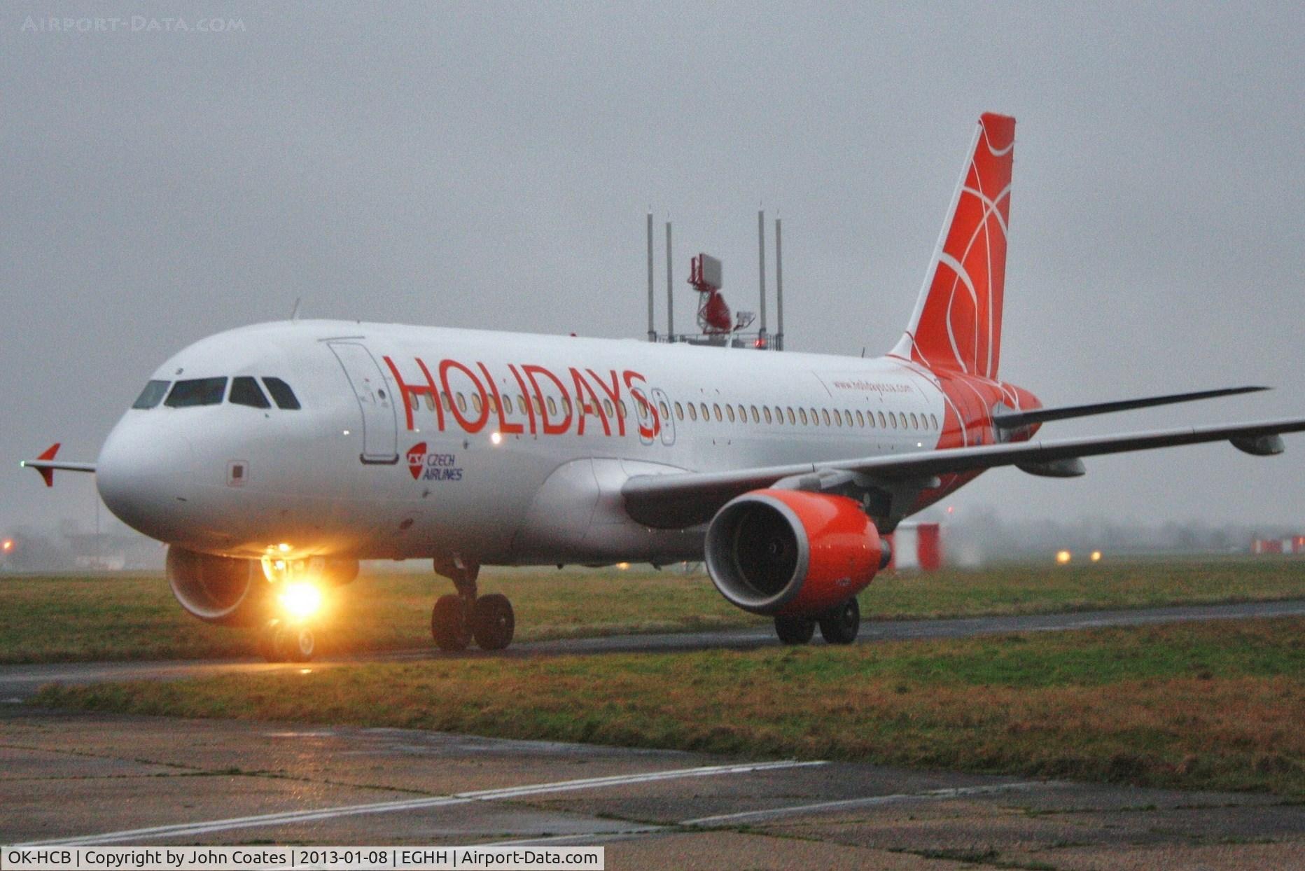 OK-HCB, 2004 Airbus A320-214 C/N 2180, Arriving in drizzle at dusk for paint