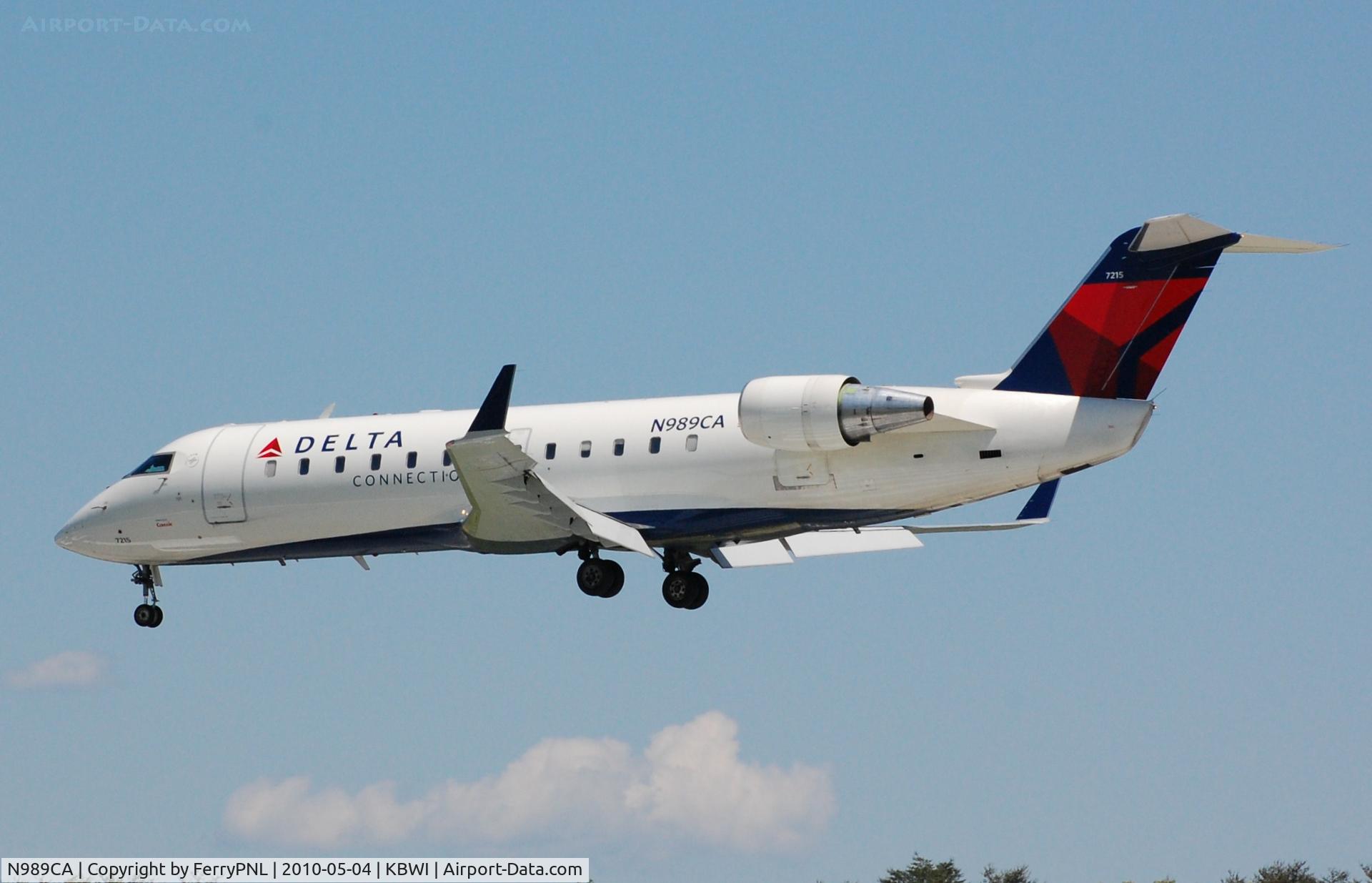 N989CA, 1998 Canadair CRJ-100ER (CL-600-2B19) C/N 7215, Over the piano key's at BWI