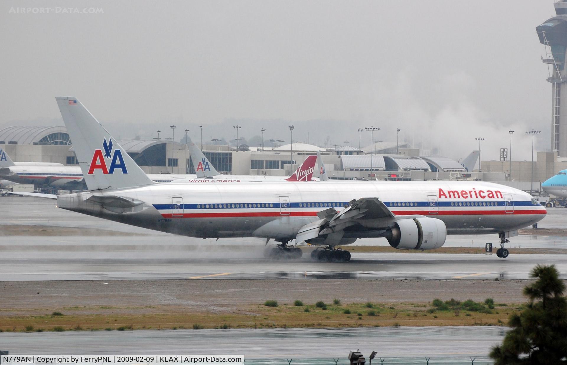 N779AN, 1999 Boeing 777-223 C/N 29955, Maybe you might notice that it rained