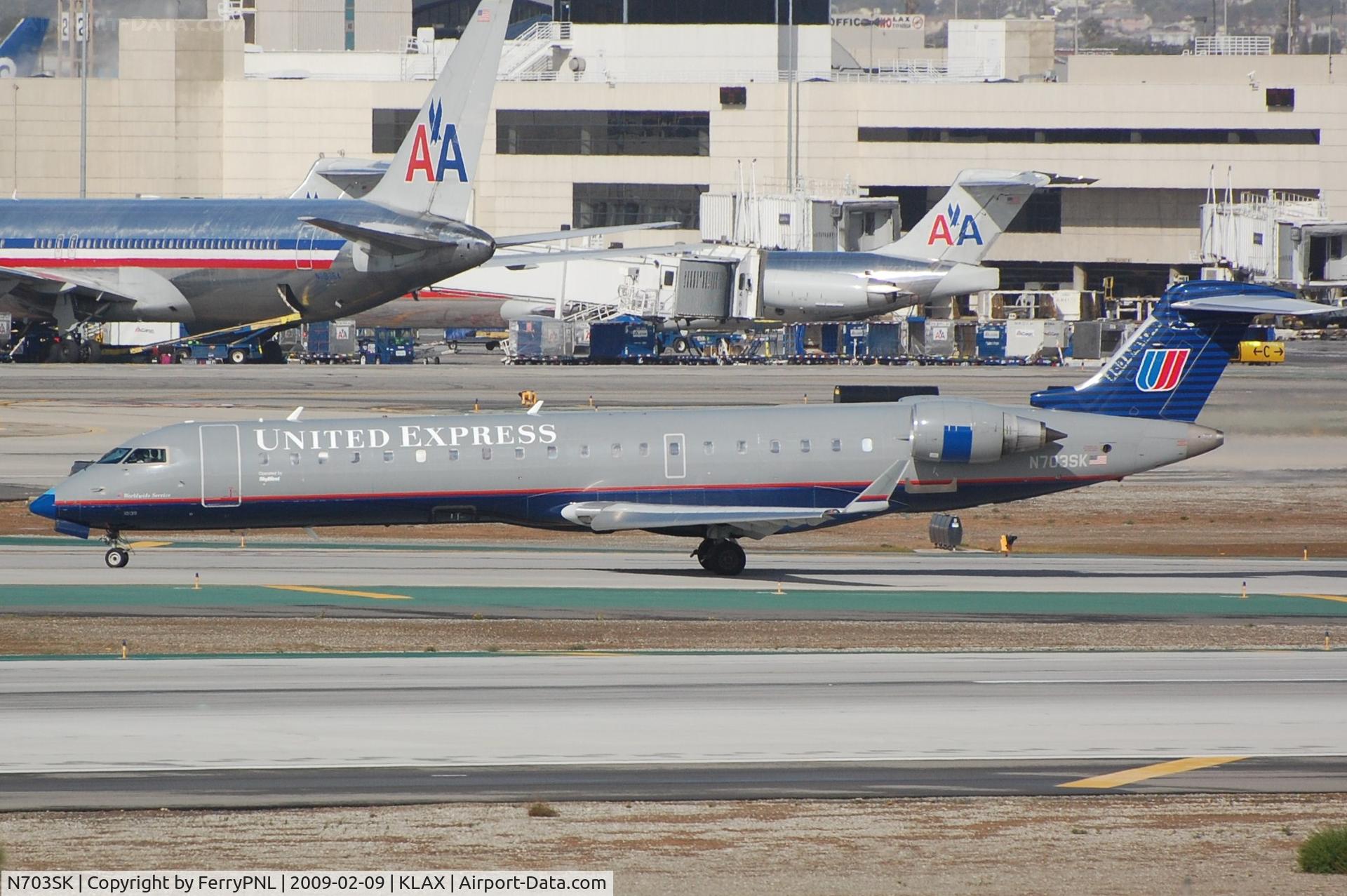 N703SK, 2004 Bombardier CRJ-701ER (CL-600-2C10) Regional Jet C/N 10139, UAE CL700 just landed