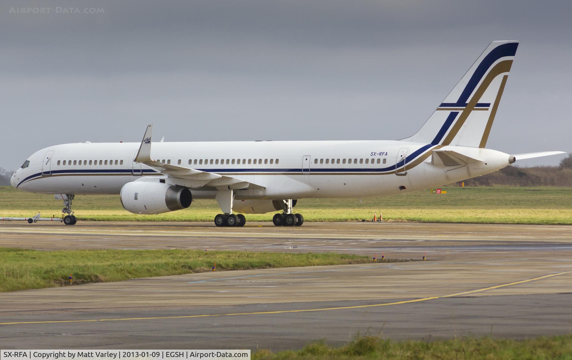 SX-RFA, 1999 Boeing 757-23N C/N 30232, Sat on stand 8 after being towed from stand 5.