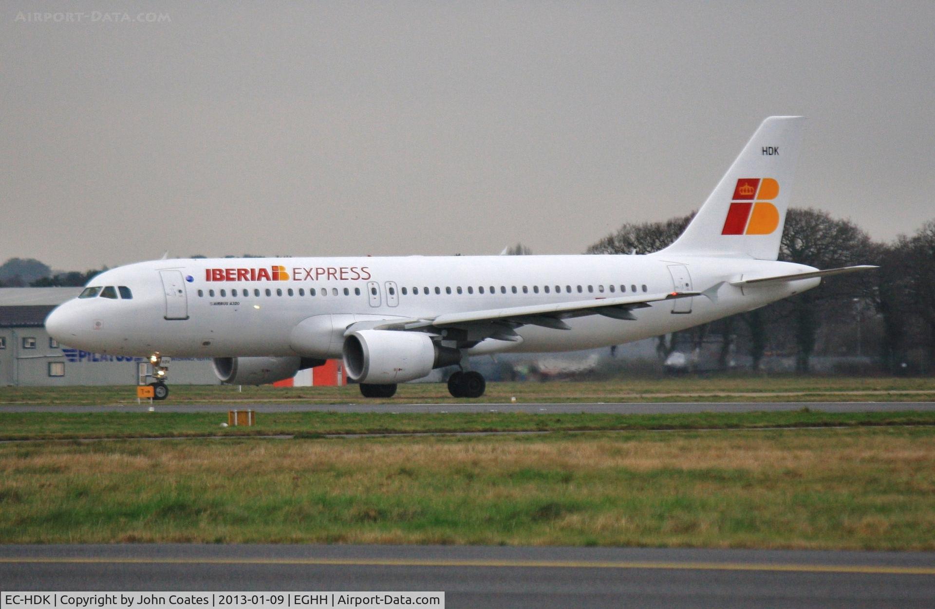 EC-HDK, 1999 Airbus A320-214 C/N 1067, Taxiing to depart in mist after respray