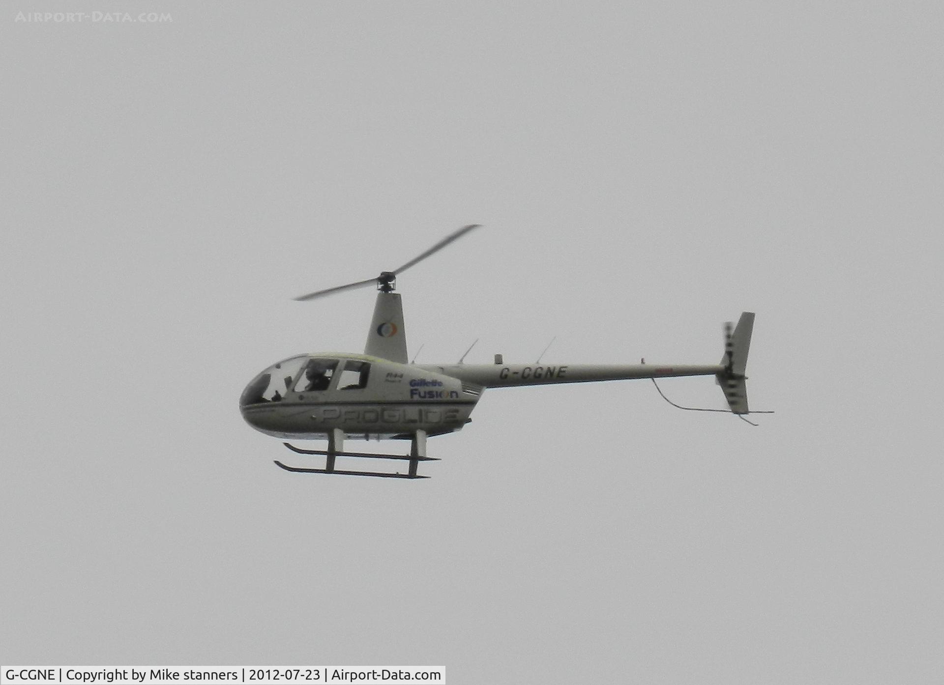 G-CGNE, 2010 Robinson R44 Raven II C/N 12952, Heliair R-44 Flying past my house in Galashiels