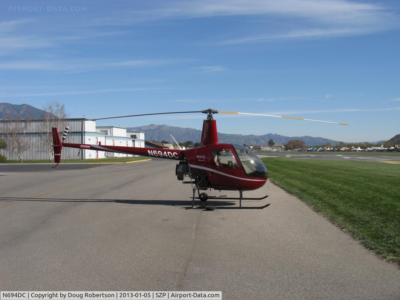 N694DC, 2004 Robinson R22 Beta C/N 3573, 2004 Robinson R22 BETA II, Lycoming O-360 derated to 131 Hp, landed, awaiting fuel truck at west end