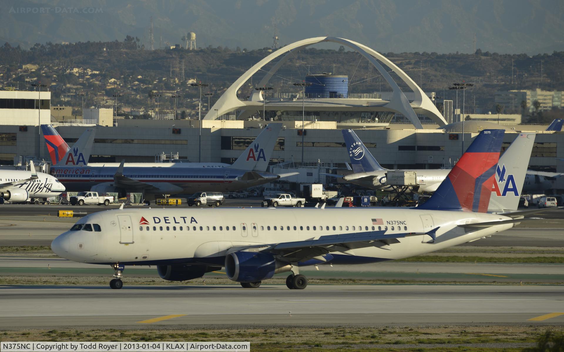 N375NC, 2002 Airbus A320-212 C/N 1789, Taxiing to gate