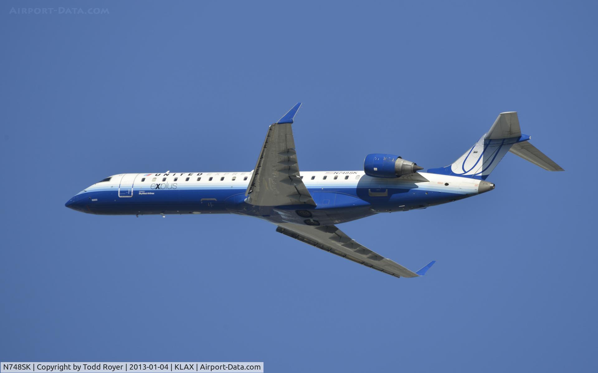 N748SK, 2005 Bombardier CRJ-700 (CL-600-2C10) Regional Jet C/N 10203, Departing LAX