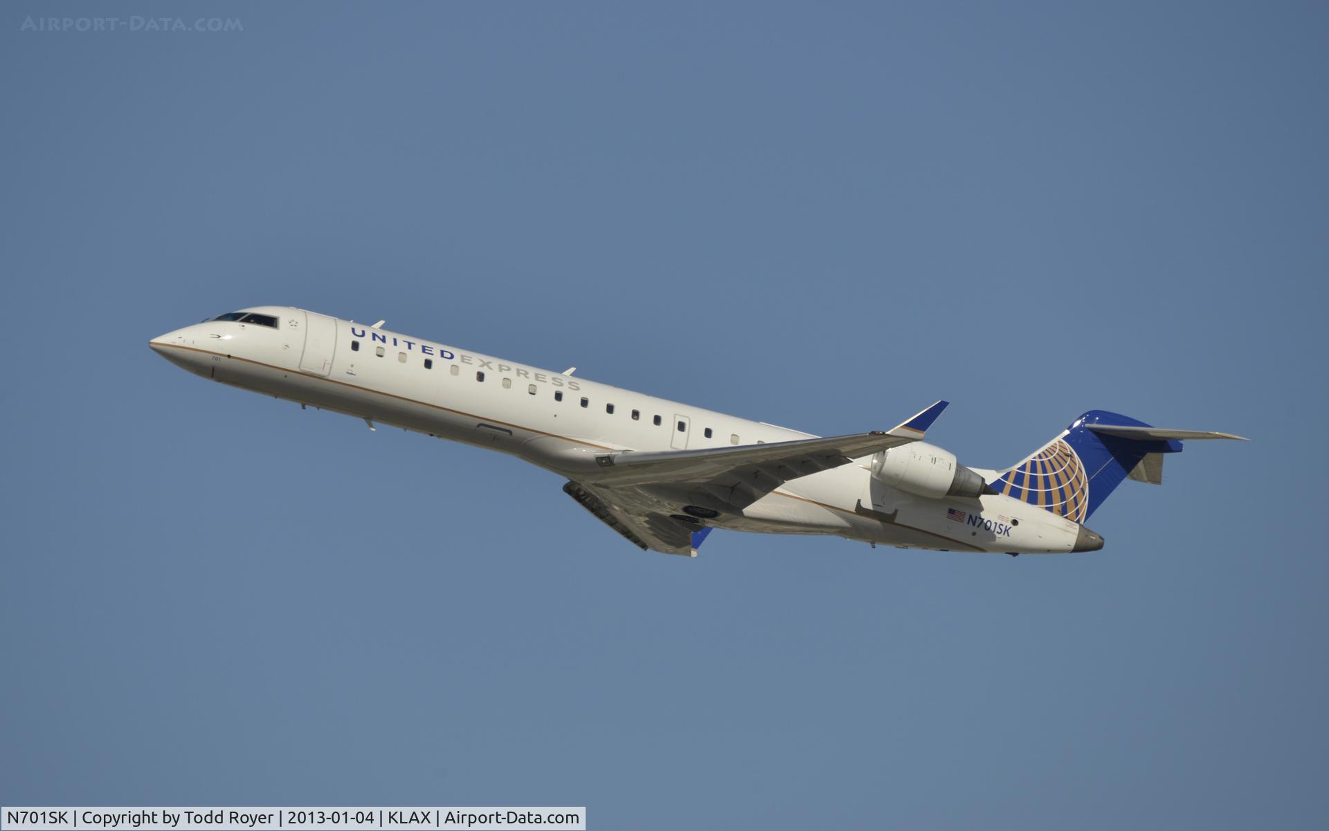 N701SK, 2004 Bombardier CRJ-700 (CL-600-2C10) Regional Jet C/N 10133, Departing LAX