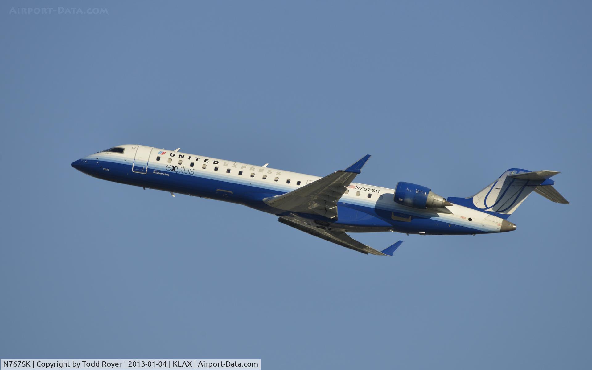N767SK, 2005 Bombardier CRJ-702 (CL-600-2C10) Regional Jet C/N 10233, Departing LAX