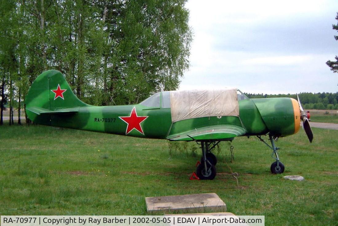 RA-70977, Yakovlev Yak-52 C/N 86615, Yakovlev Yak-52 [Unknown] Finow~D 05/05/2002. No c/n currently know this aircraft is now stored in 1 of the hangars and no longer on display.