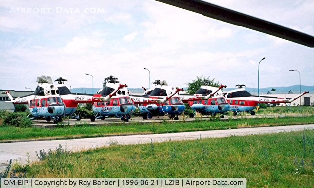 OM-EIP, 1975 Mil Mi-2 Hoplite C/N 513830114, Mil Mi-2 Hoplite [513830114] (Slov-Air) Bratislava-M R Stefanik~OM 21/06/1996. This the 2nd from the left along with 7 others shown stored here.