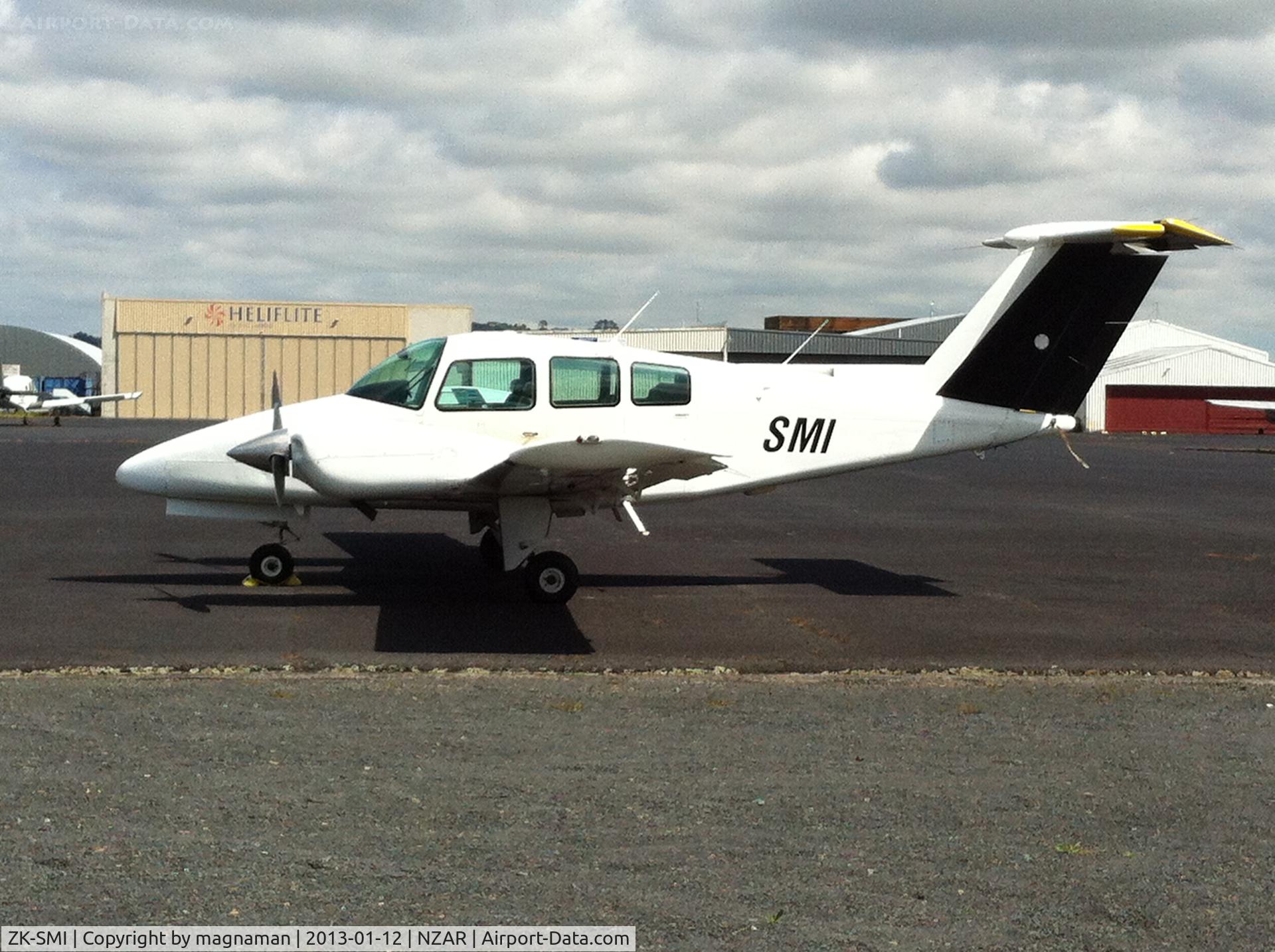 ZK-SMI, Beech 76 Duchess C/N ME-151, Lounging around in the sun.