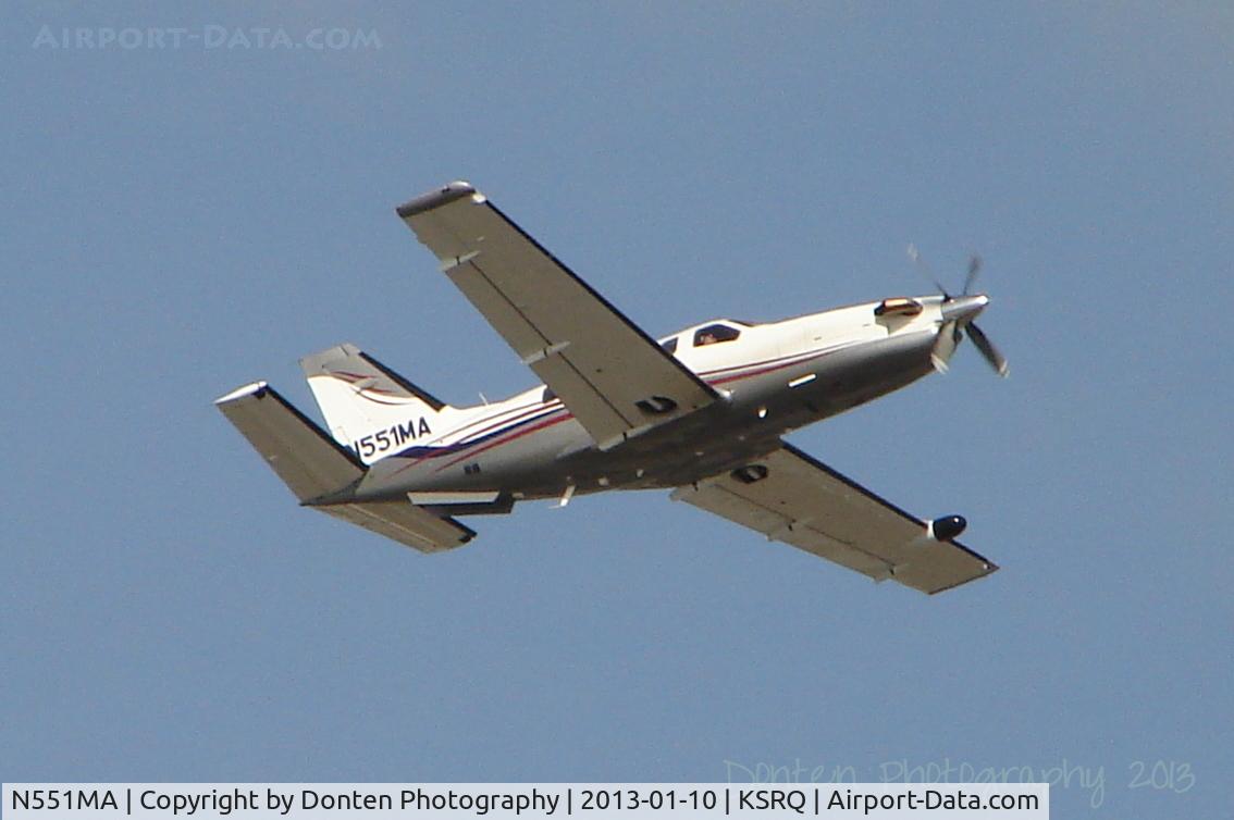 N551MA, Socata TBM-700 C/N 516, Robinson R-44 (N71977) departs Sarasota-Bradenton International Airport