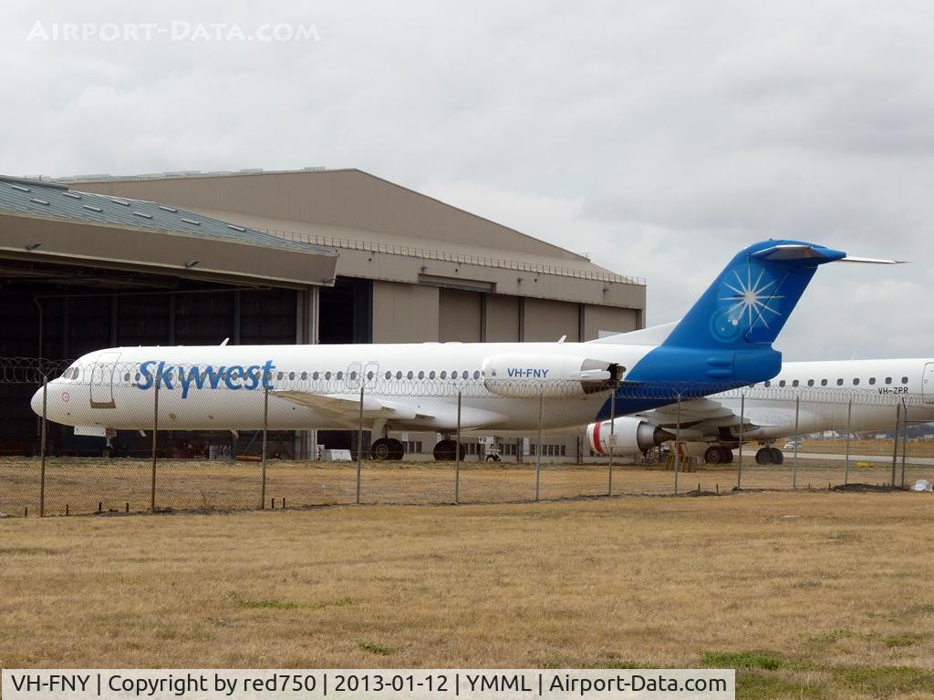 VH-FNY, 1994 Fokker 100 (F-28-0100) C/N 11484, FNY parked at YMML.