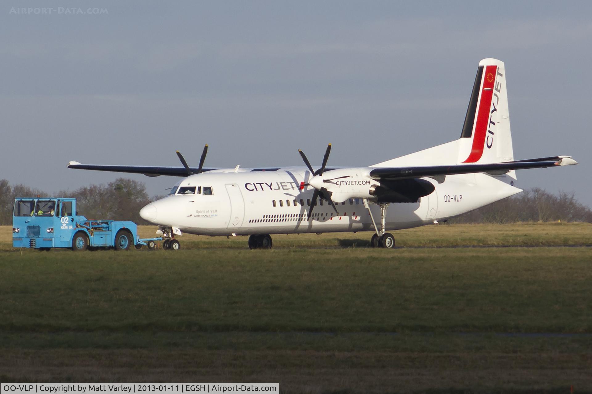 OO-VLP, 1991 Fokker 50 C/N 20209, Being pulled to the Eastern Apron.