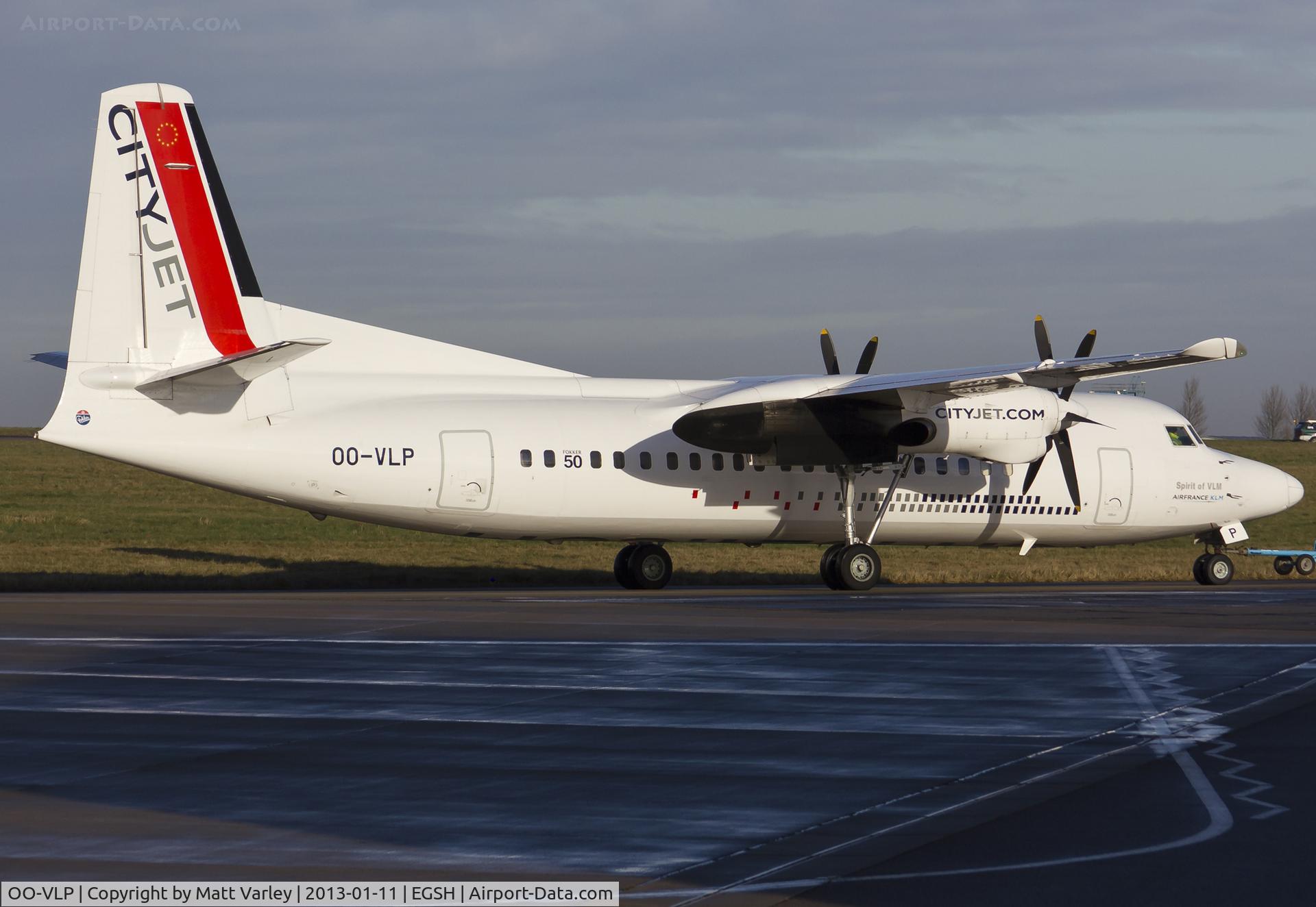 OO-VLP, 1991 Fokker 50 C/N 20209, Being pulled to the Eastern Apron.
