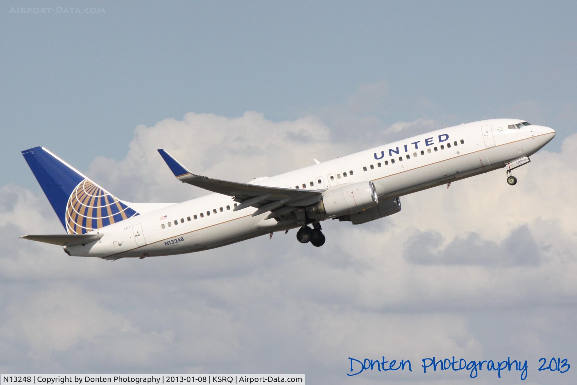 N13248, 1999 Boeing 737-824 C/N 28808, United Flight 1190 (N13248) departs Sarasota-Bradenton International Airport enroute to Chicgo-O'Hare International Airport
