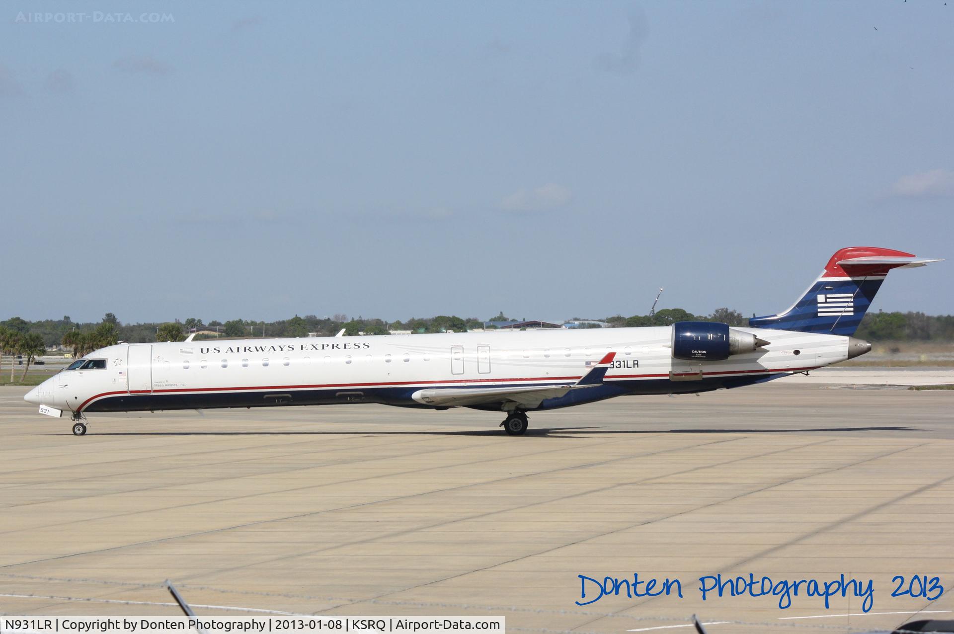 N931LR, 2005 Bombardier CRJ-900ER (CL-600-2D24) C/N 15031, US Air Flight 2678 operated by Mesa (N931LR) prepares for flight at Sarasota-Bradenton International Airport