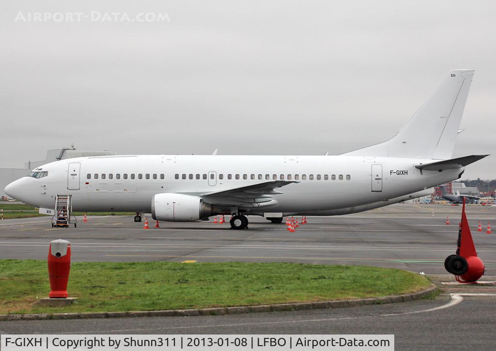 F-GIXH, 1987 Boeing 737-353 C/N 23788, Parked at the Cargo apron... Now in all white c/s without titles