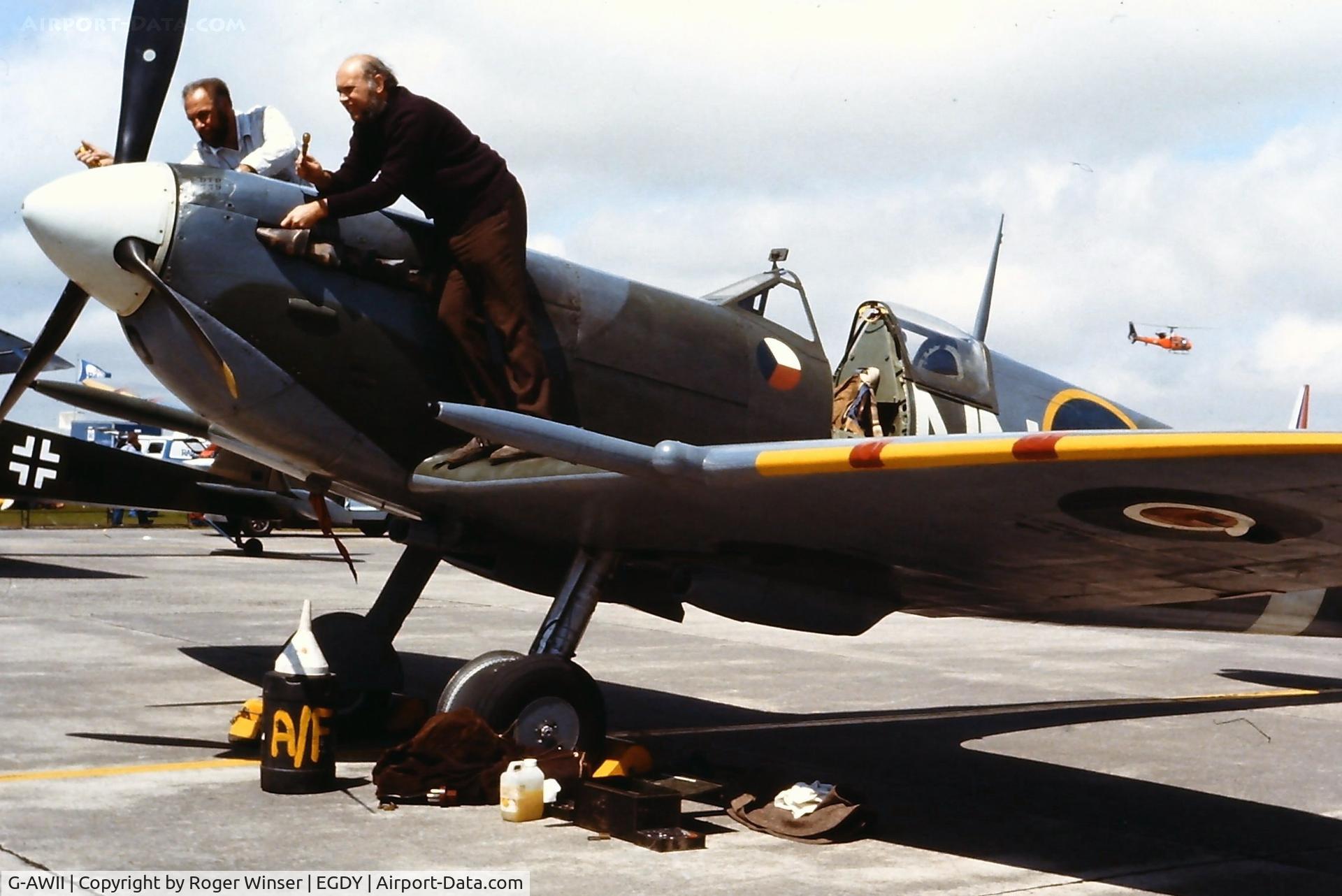 G-AWII, 1942 Supermarine 349 Spitfire LF.Vc C/N WASP/20/223, This Westland built Spitfire was AR501 in RAF service. In the markings of 310 (Czechoslovak) Squadron RAF and coded NN-D. At a RNAS Yeovilton Naval Air Day in the late 1970's/1980's, date to be confirmed.