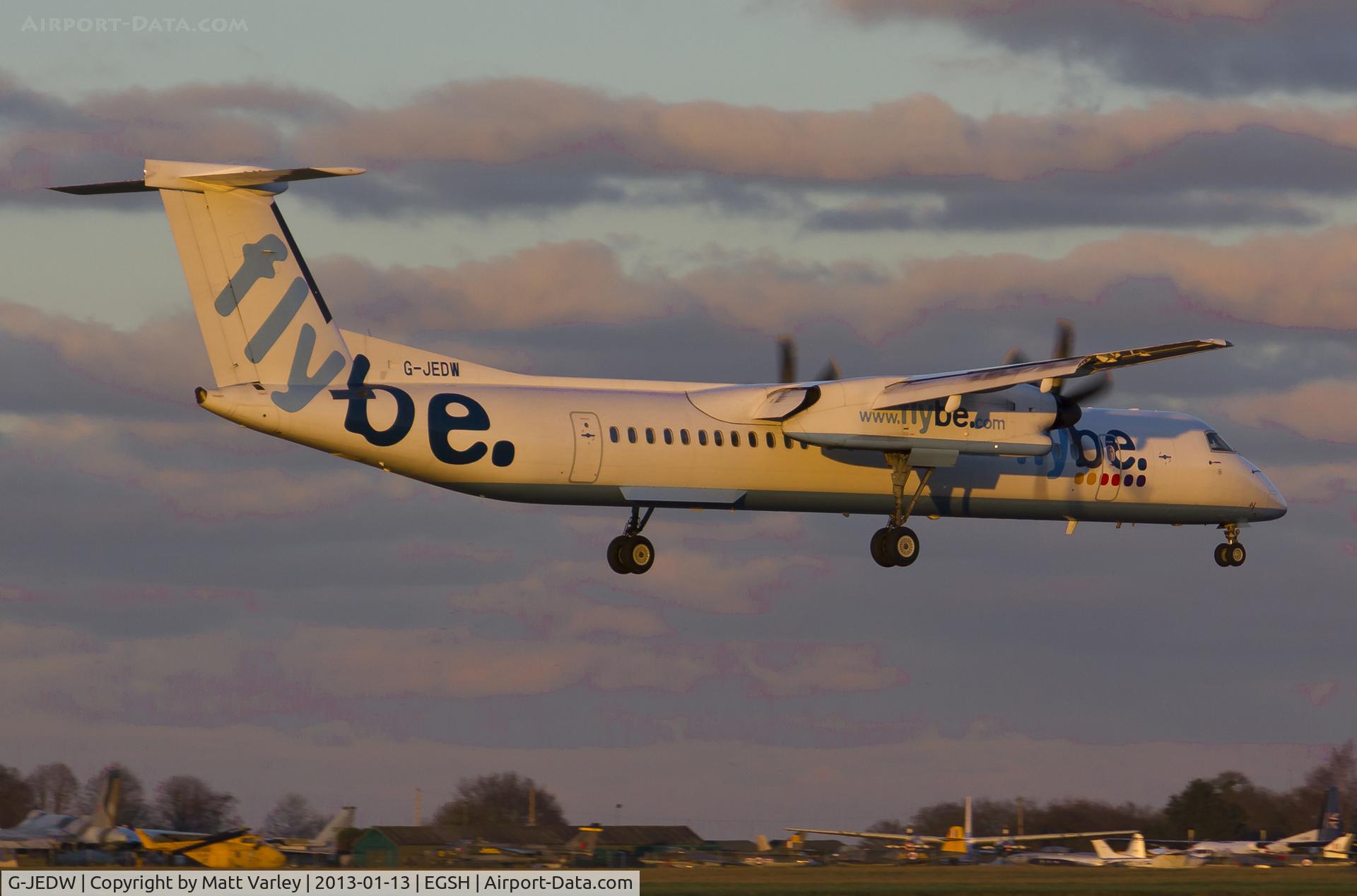 G-JEDW, 2004 De Havilland Canada DHC-8-402Q Dash 8 C/N 4093, Arriving at EGSH in the setting sun.