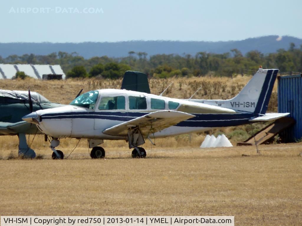 VH-ISM, 1979 Beech C24R C/N MC-670, This Beech Sierra is seen through the heat haze, parked at Melton airfield.