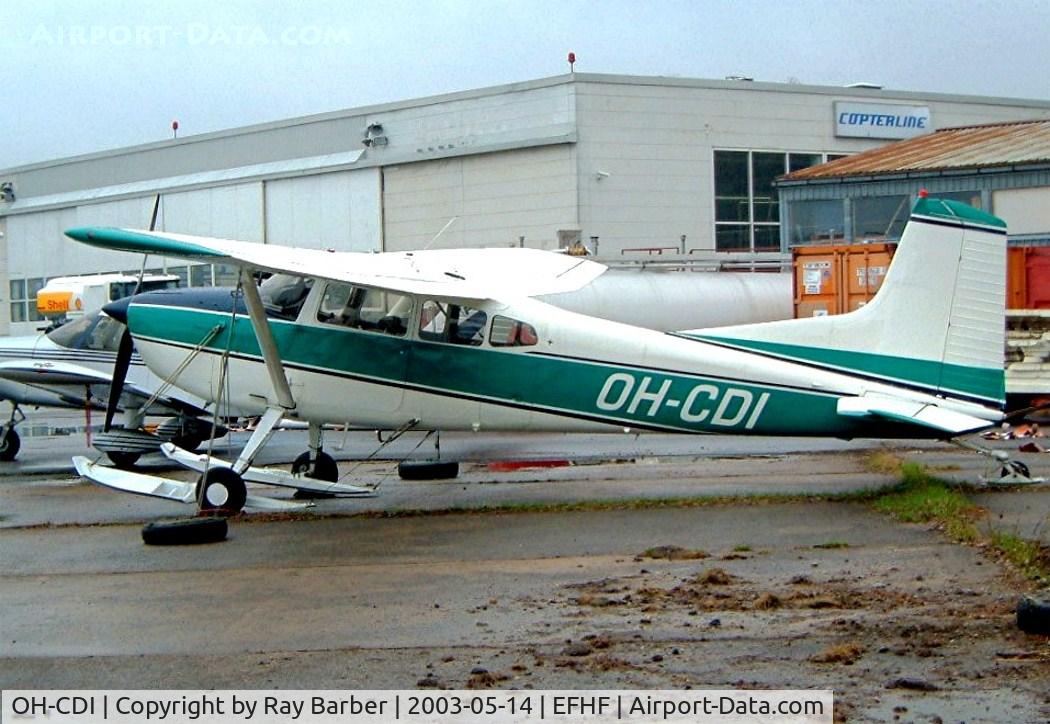 OH-CDI, Cessna A185E Skywagon 185 C/N 185-1529, Cessna A.185E Skywagon 185 [185-1529] Helsinki-Malmi~OH 14/05/2003. Seen here with snow ski's.