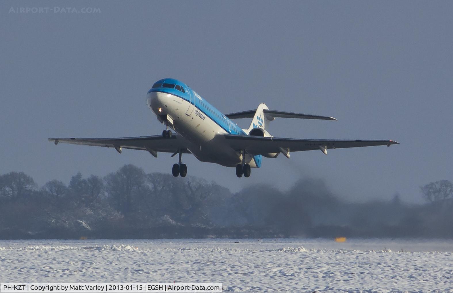 PH-KZT, 1995 Fokker 70 (F-28-0070) C/N 11541, Climbing out of a snowy EGSH.