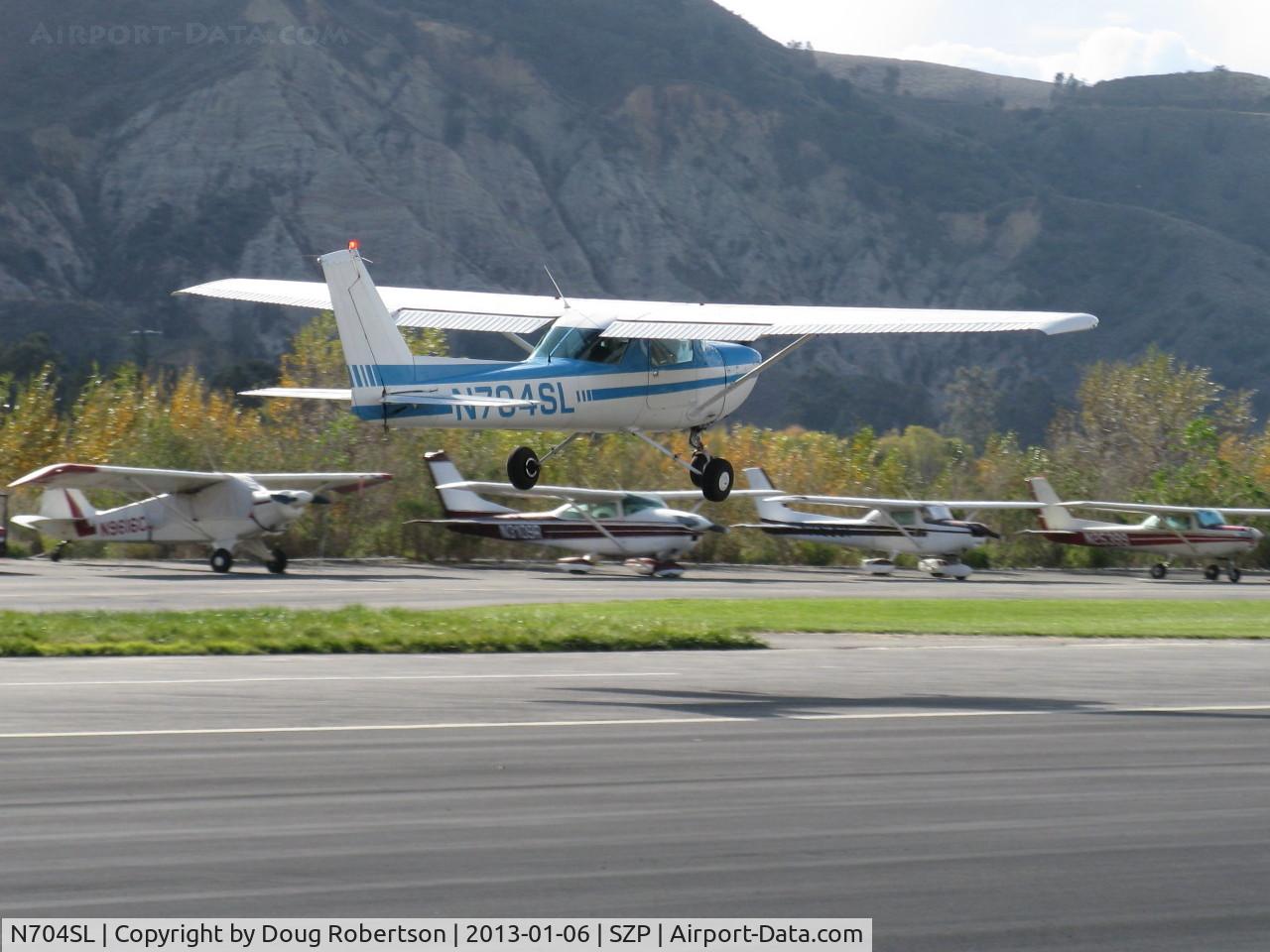 N704SL, 1976 Cessna 150M C/N 15078837, 1976 Cessna 150M, Cont9inental O-200 100 Hp, landing Rwy 22 in gusty crosswind