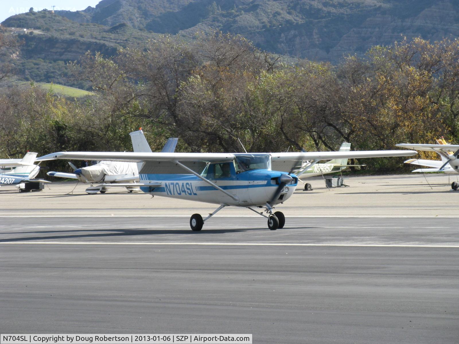 N704SL, 1976 Cessna 150M C/N 15078837, 1976 Cessna 150M, Continental O-200 100 Hp, landing roll Rwy 22, doing pattern work