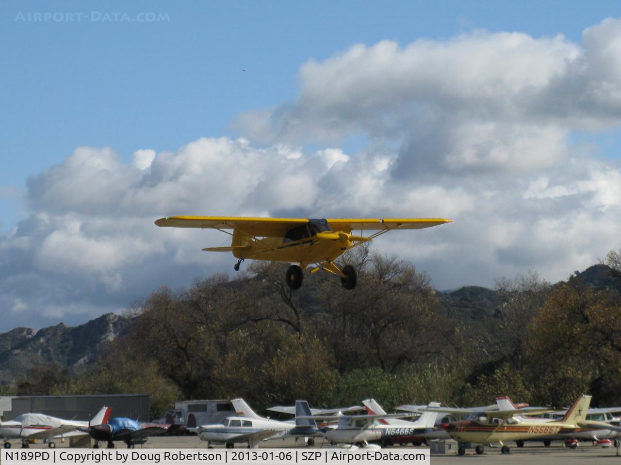 N189PD, Cub Crafters CC11-160 Carbon Cub SS C/N CC11-00189, 2011 Cubcrafters CC11-160 CARBON CUB, Lycoming O-360-based CC340 with O-320 cylinders rated at 180 Hp for 5 minutes, 80 Hp cruise, on final for STOL Rwy 22L grass