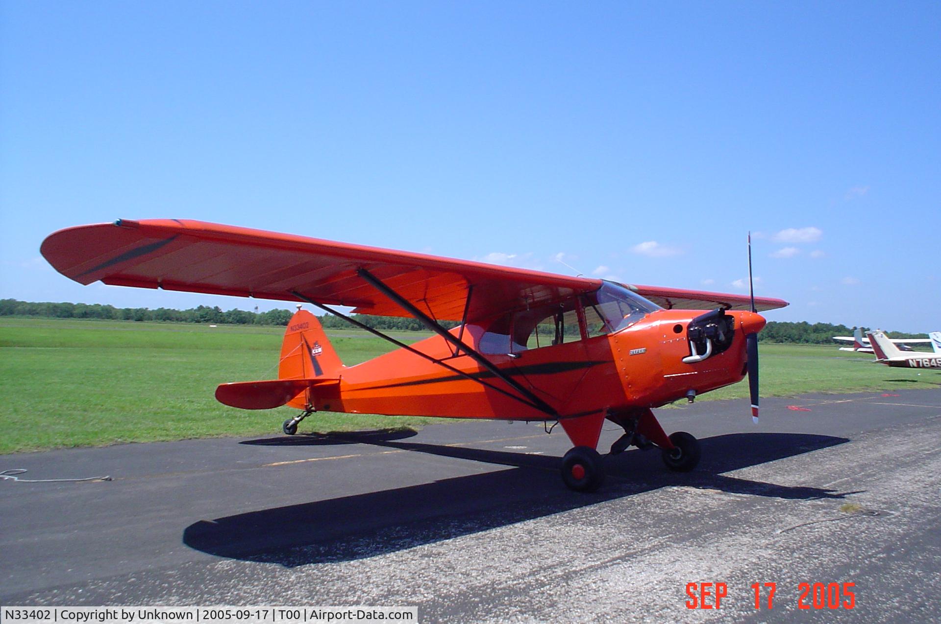 N33402, 1940 Piper J5A Cub Cruiser C/N 5-495, Gator Fest Fly-in 1 week before being destroyed by Hurricane Rita in 2005.