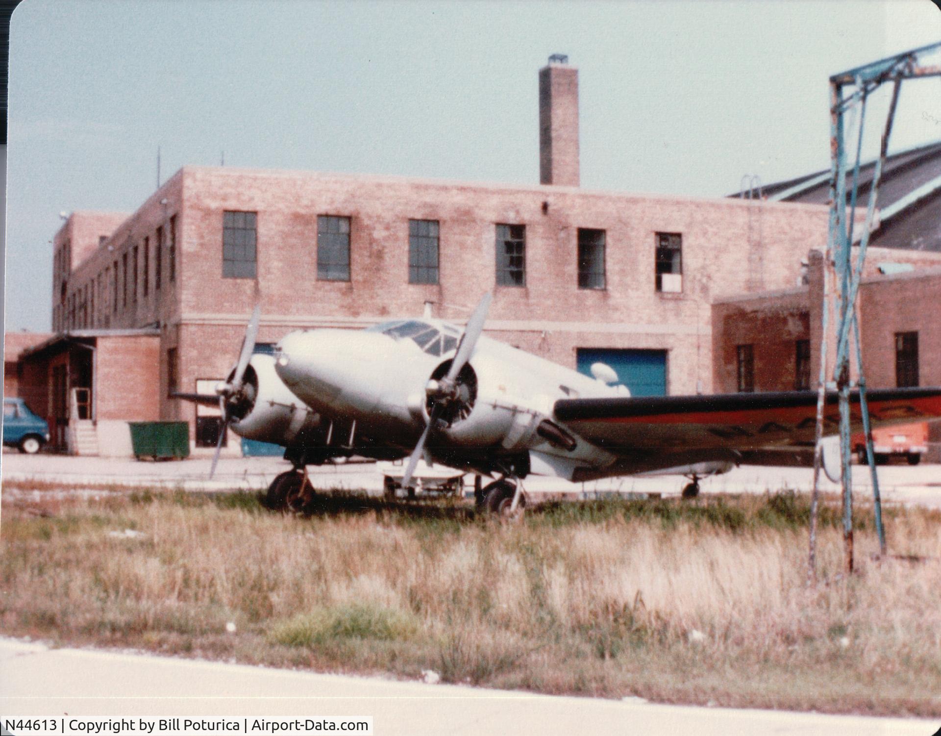 N44613, 1945 Beech D18S C/N A-21, Chicago Midway 1970's