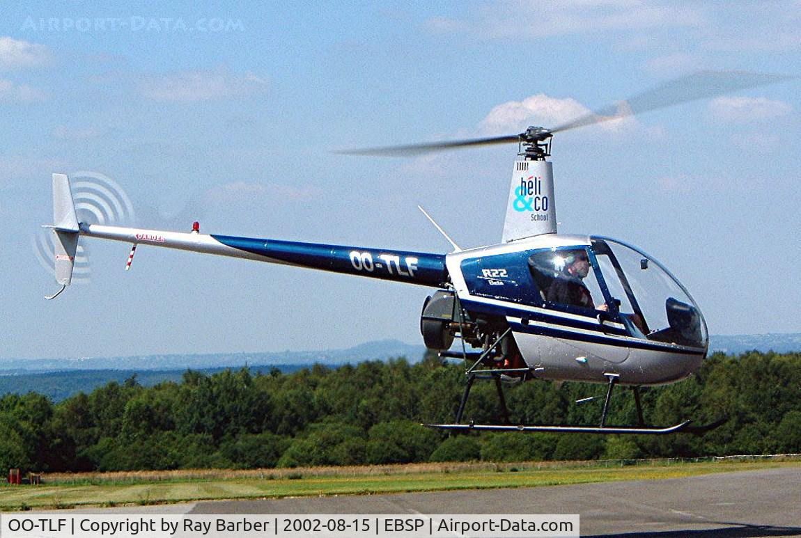 OO-TLF, 1992 Robinson R22 Beta C/N 2116, Robinson R-22 Beta [2116] Spa-La Sauvenière~OO 15/08/2002. This was damaged beyond repair here on 08-02-2003 after a heavy landing.