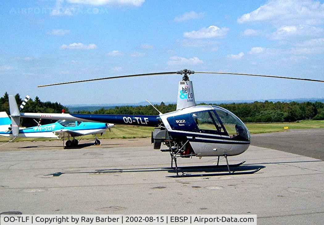 OO-TLF, 1992 Robinson R22 Beta C/N 2116, Robinson R-22 Beta [2116] Spa-La Sauvenière~OO 15/08/2002. This was damaged beyond repair here on 08-02-2003 after a heavy landing.