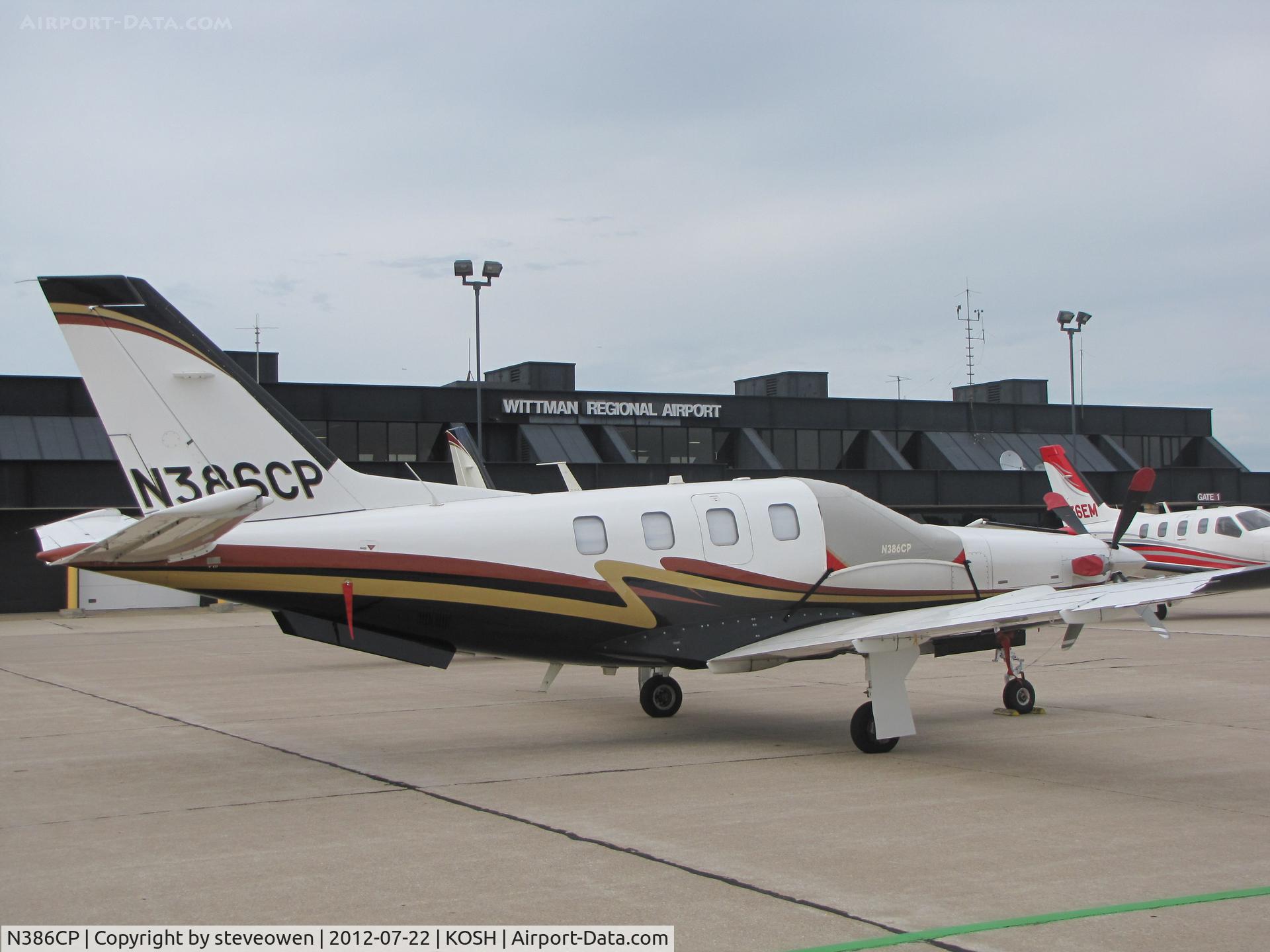 N386CP, Socata TBM-700 C/N 477, Orion FBO ramp Oshkosh EAA2012