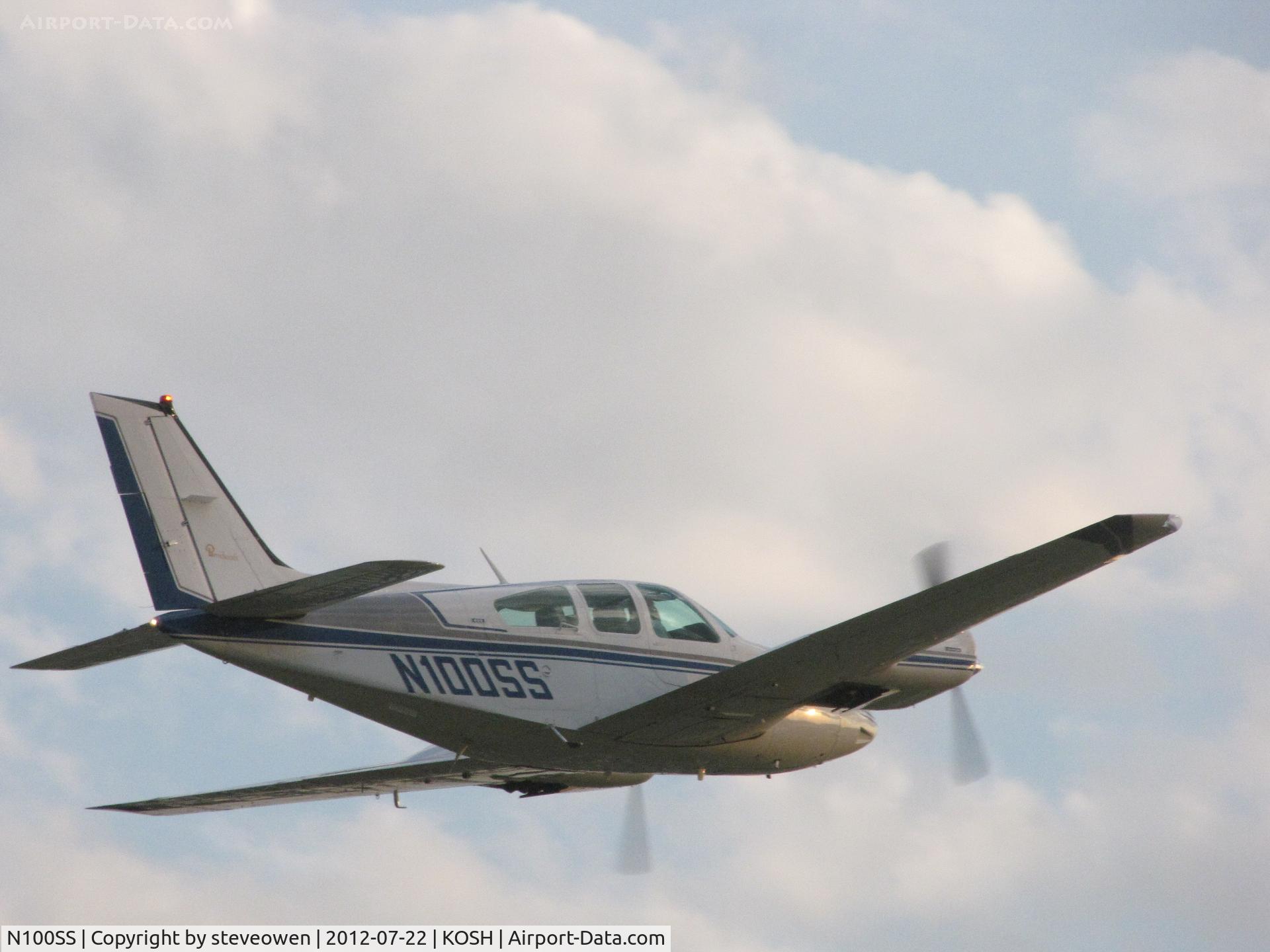 N100SS, 1975 Beech 95-B55 (T42A) Baron C/N TC-1884, over the runway at Oshkosh