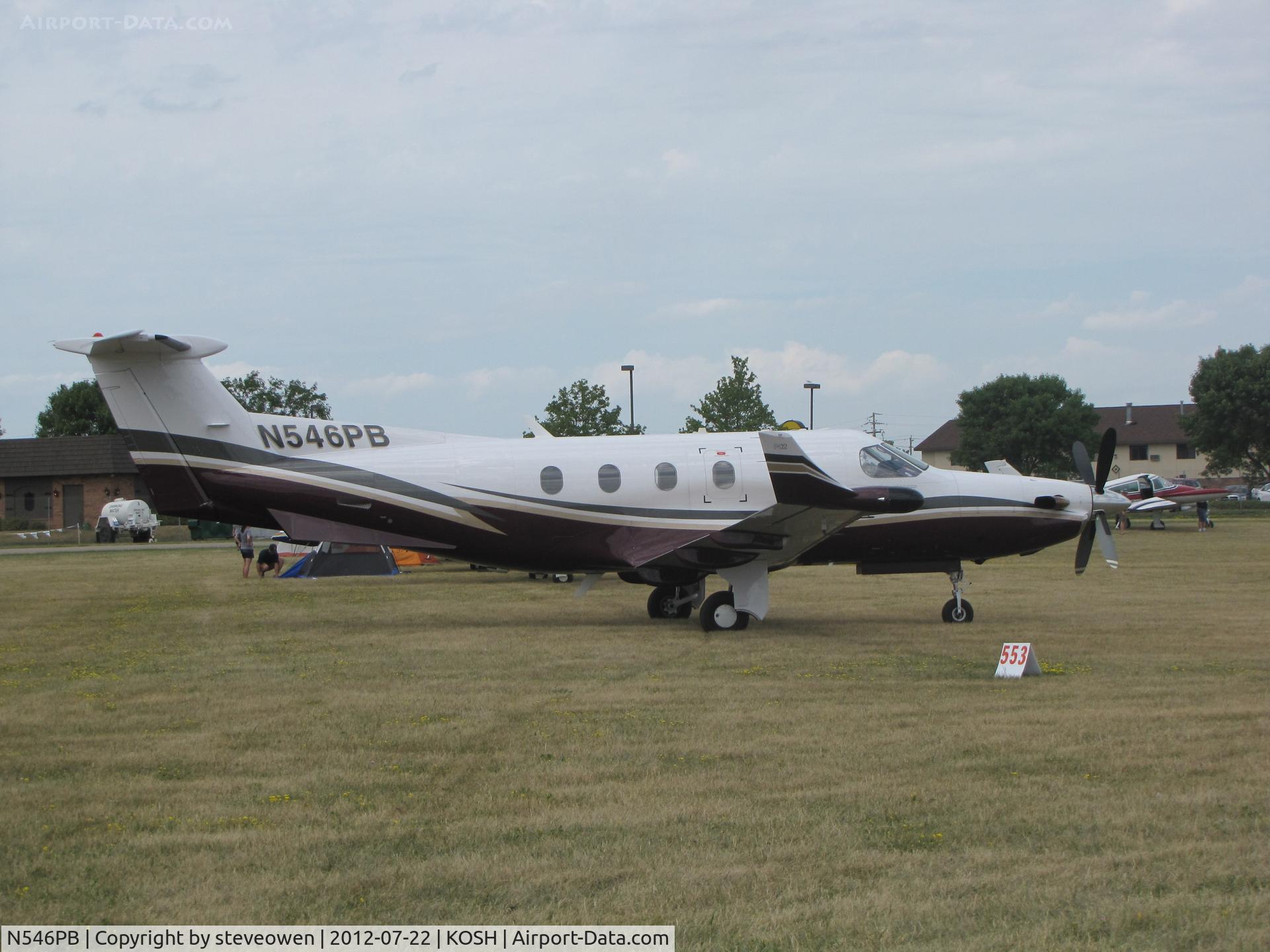 N546PB, 2004 Pilatus PC-12/45 C/N 546, taxing in the grass taxi way at Oshkosh