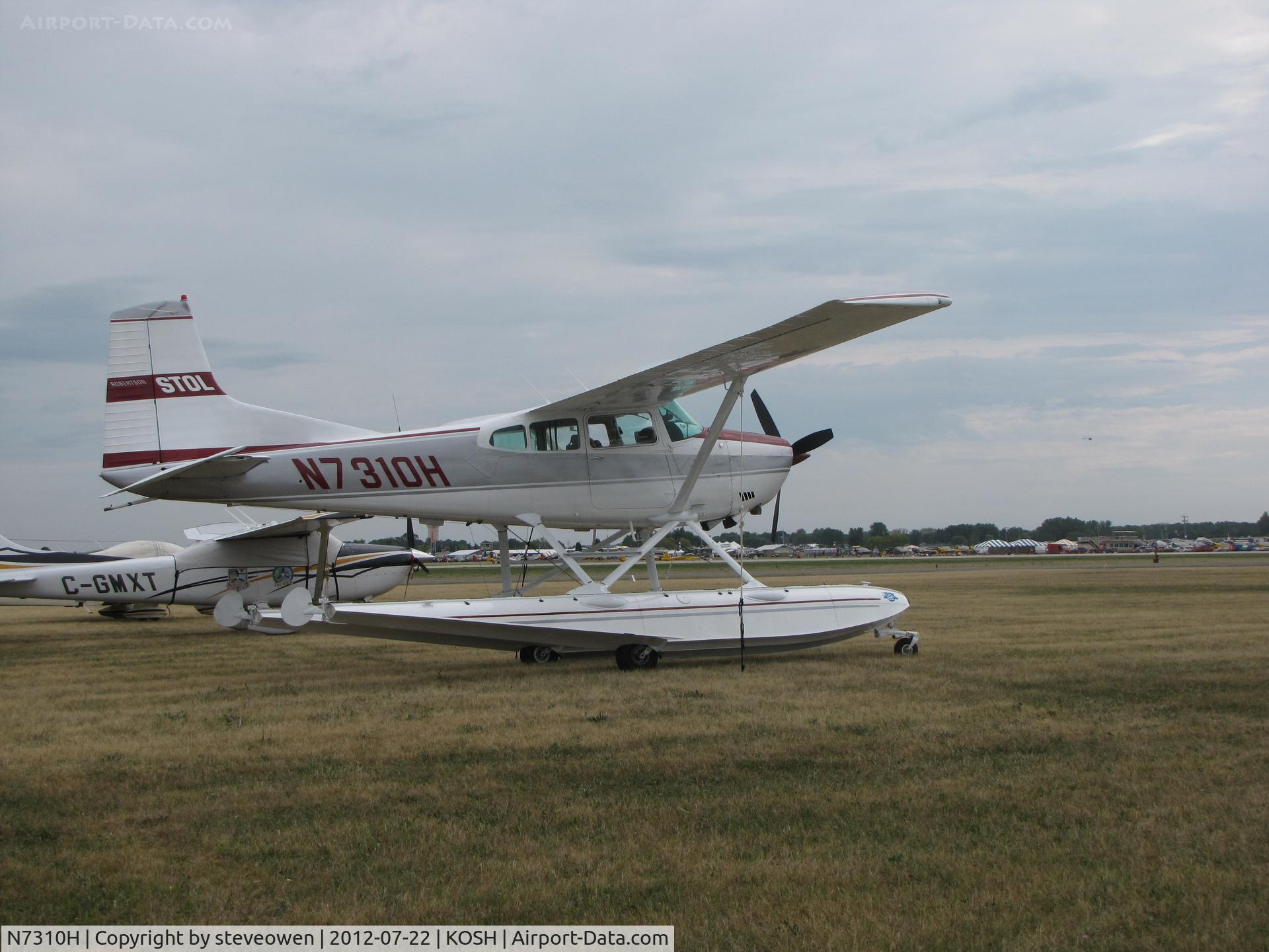 N7310H, 1977 Cessna A185F Skywagon 185 C/N 18503356, Little out of place on the grass