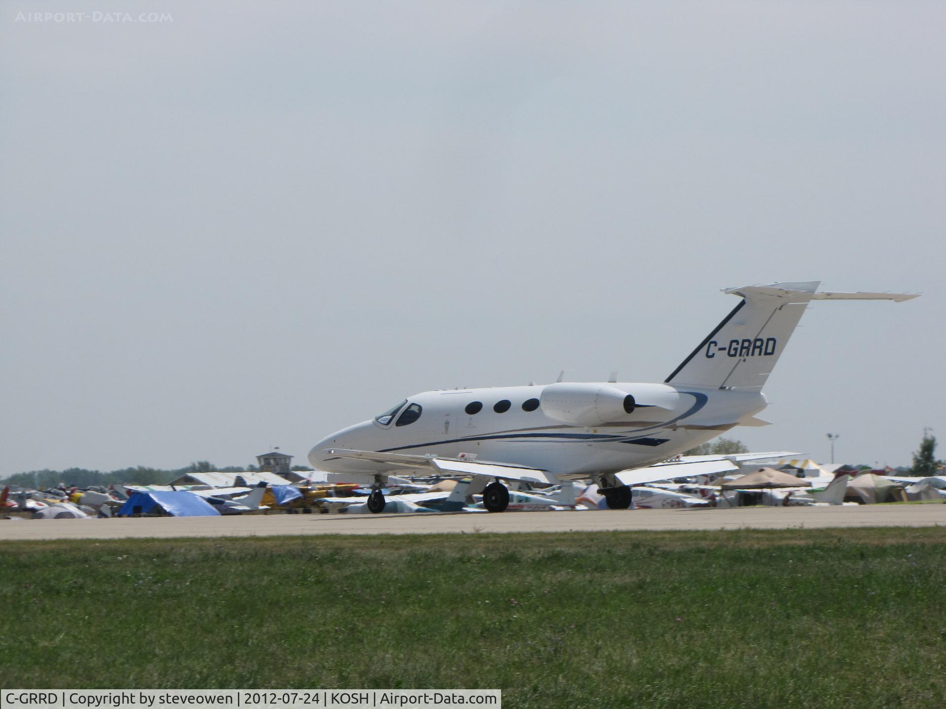 C-GRRD, 2009 Cessna 510 Citation Mustang Citation Mustang C/N 510-0232, Taxing at Oshkosh2012