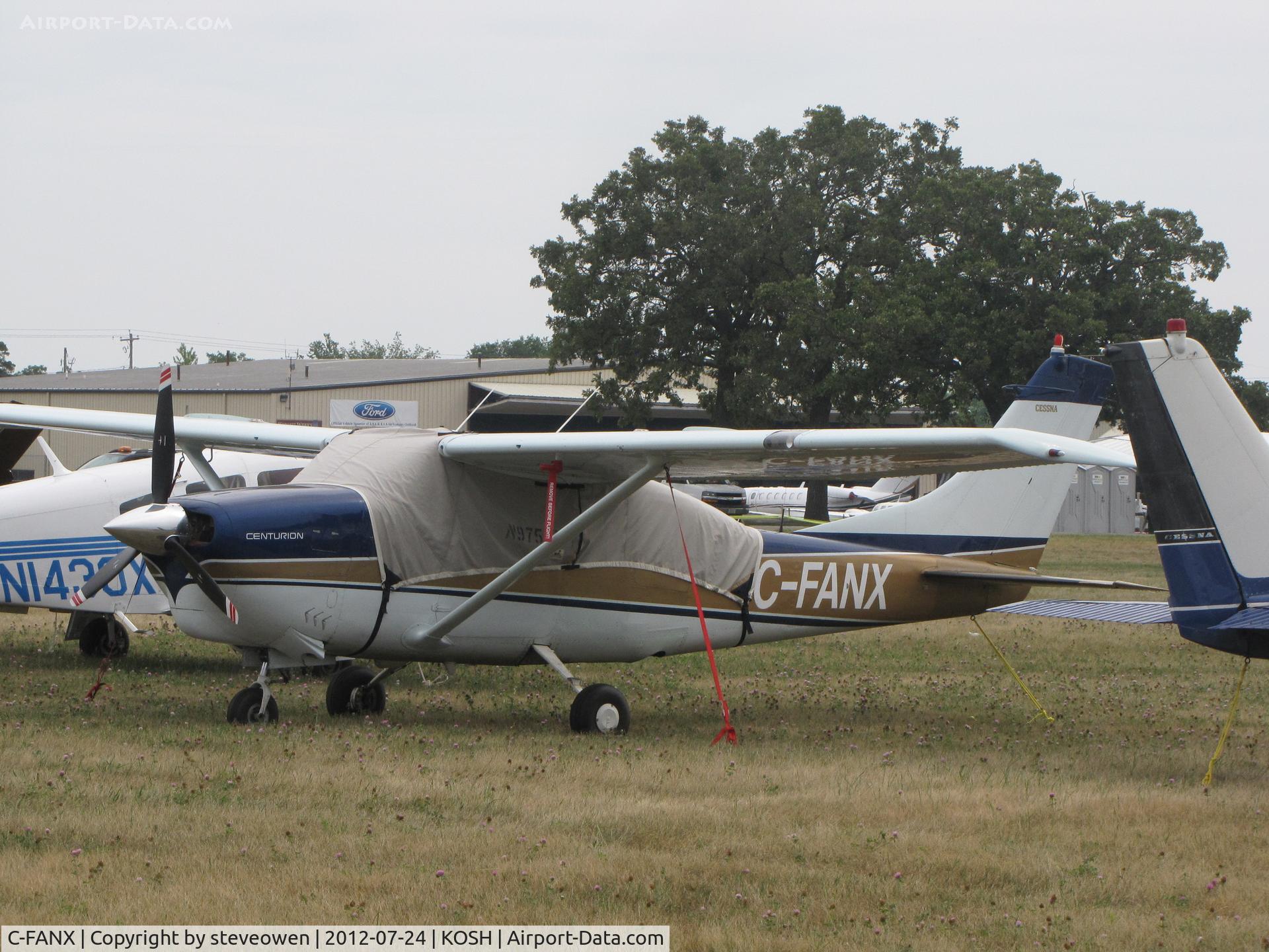 C-FANX, 1962 Cessna 210B C/N 21058055, Park at Oshkosh