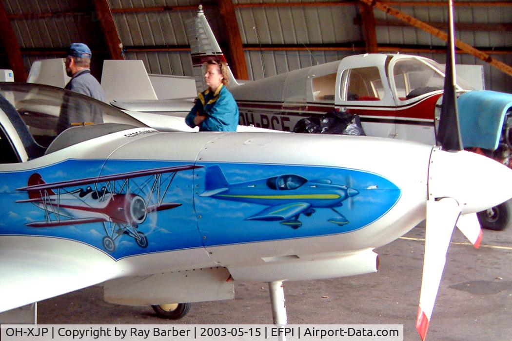 OH-XJP, Lancair 320 C/N 169, Lancair 320 [169] Piikajarvi~OH 15/05/2003. Showing the art work on this side of the aircraft.