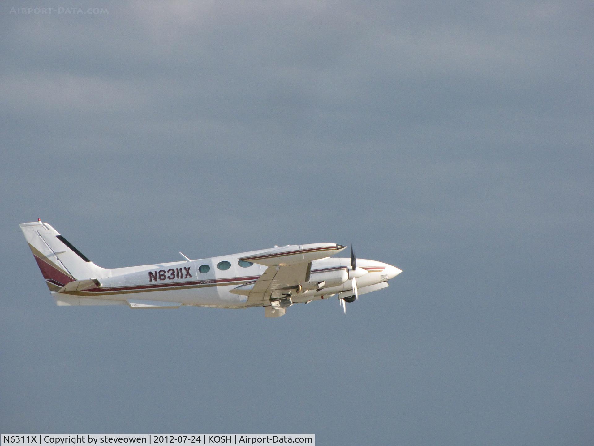 N6311X, 1978 Cessna 340A C/N 340A0482, leaving Oshkosh