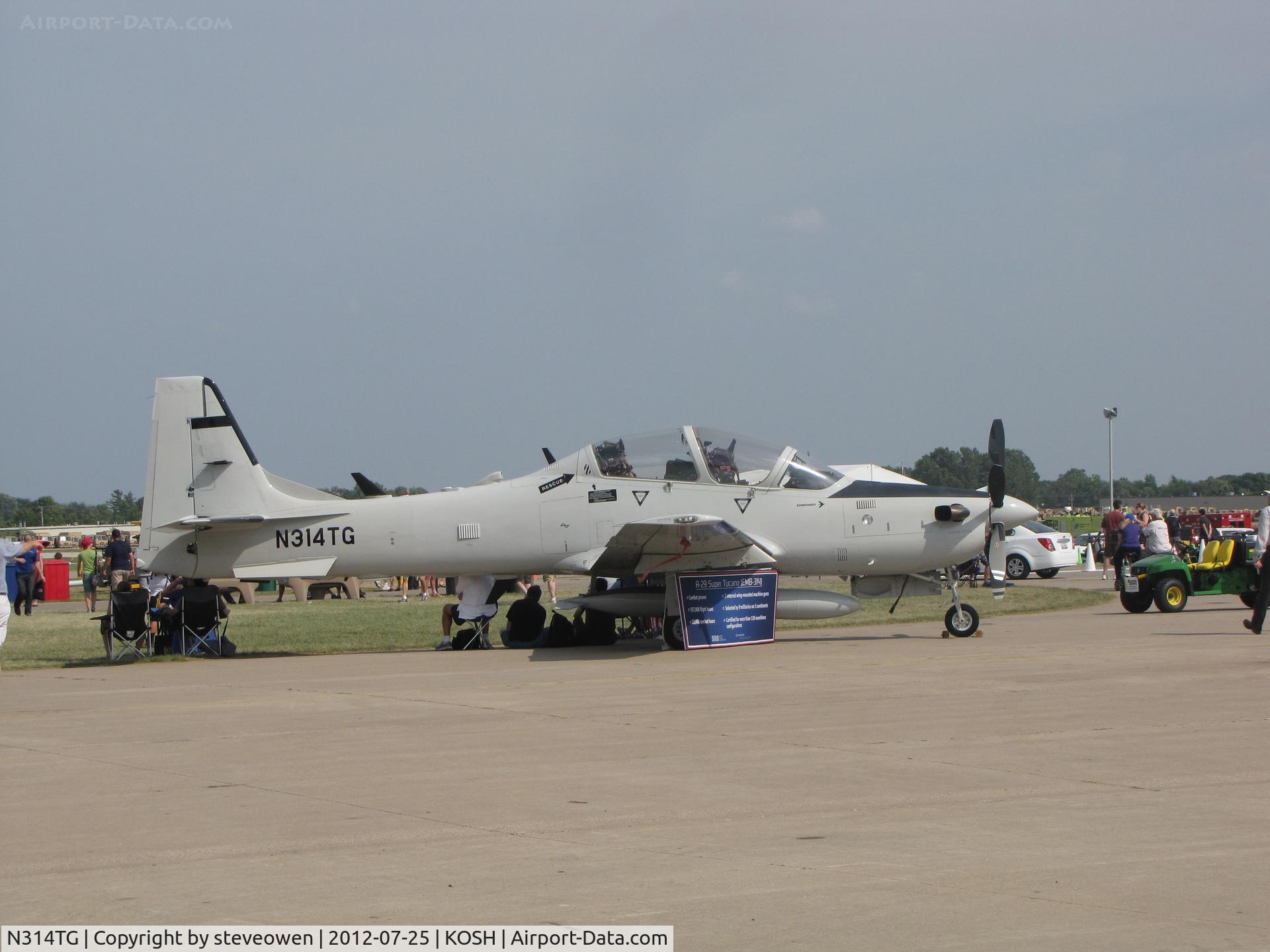 N314TG, Embraer EMB-314B1 Super Tucano C/N 31400082, on the West ramp at Oshkosh