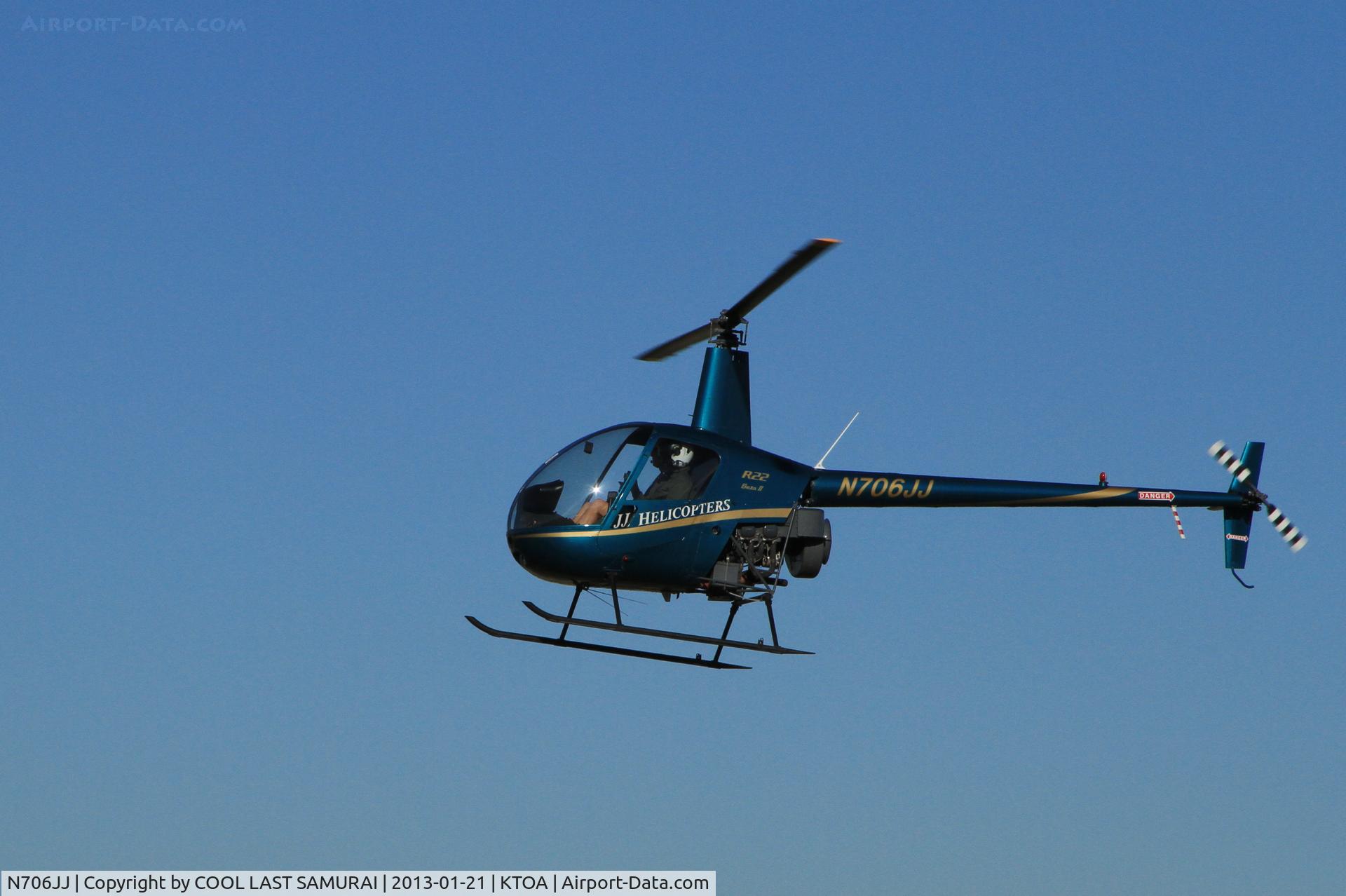 N706JJ, 2008 Robinson R22 C/N 4306, flying over TOA Taxi-way A