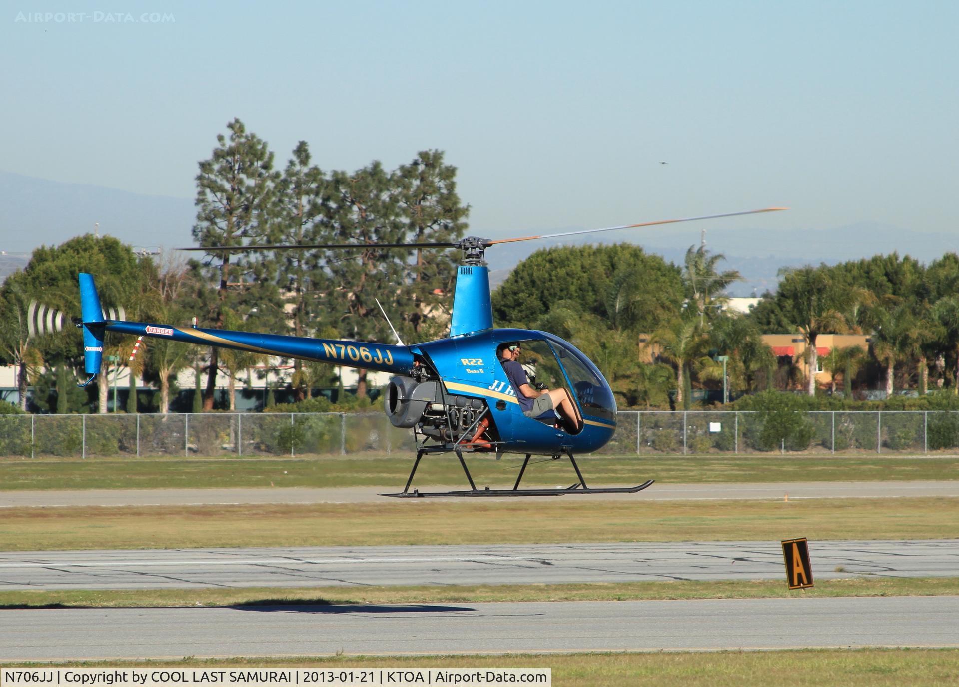 N706JJ, 2008 Robinson R22 C/N 4306, hovering over Taxi-way A