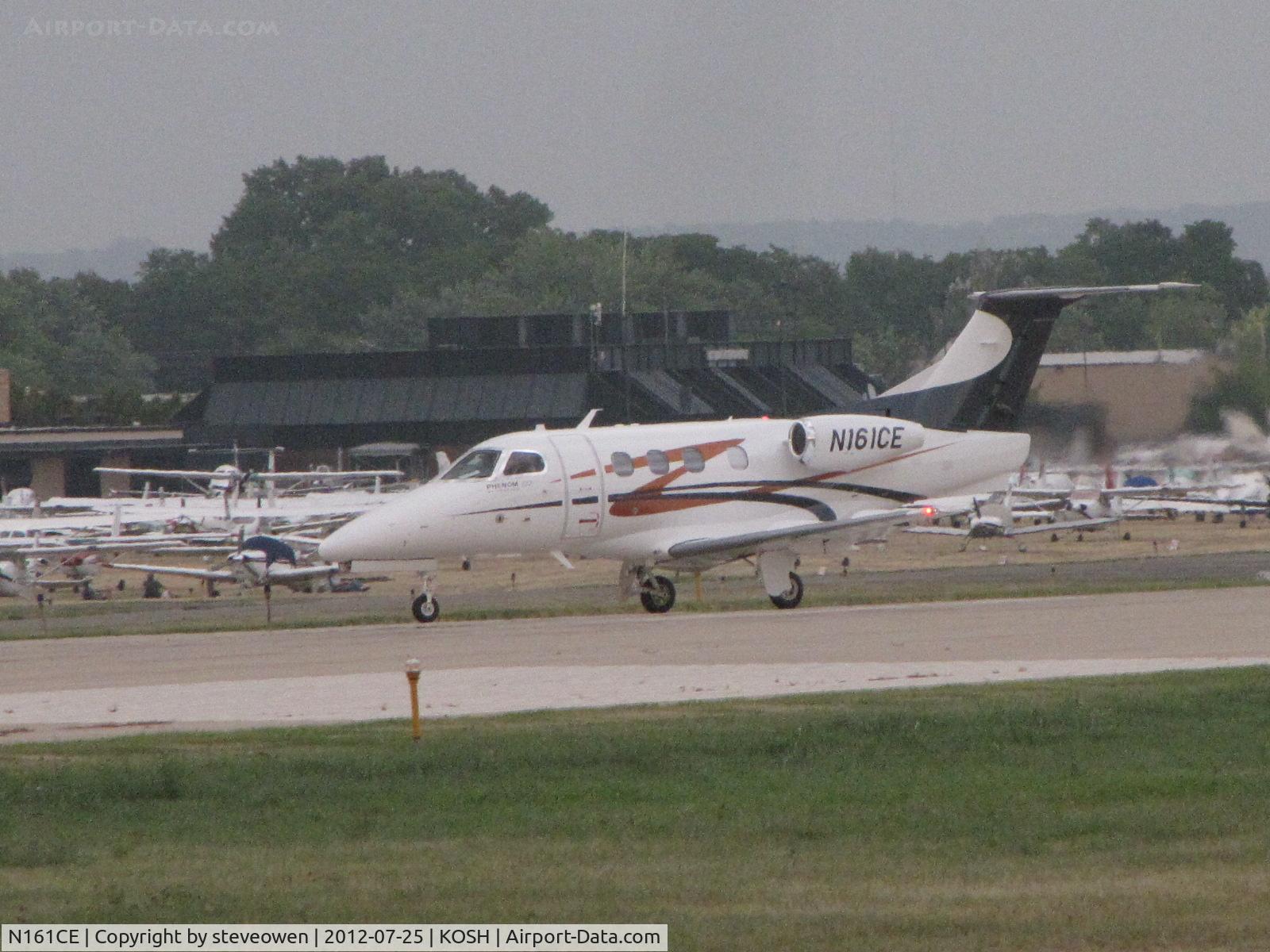N161CE, 2012 Embraer EMB-500 Phenom 100 C/N 50000274, landing at Oshkosh
