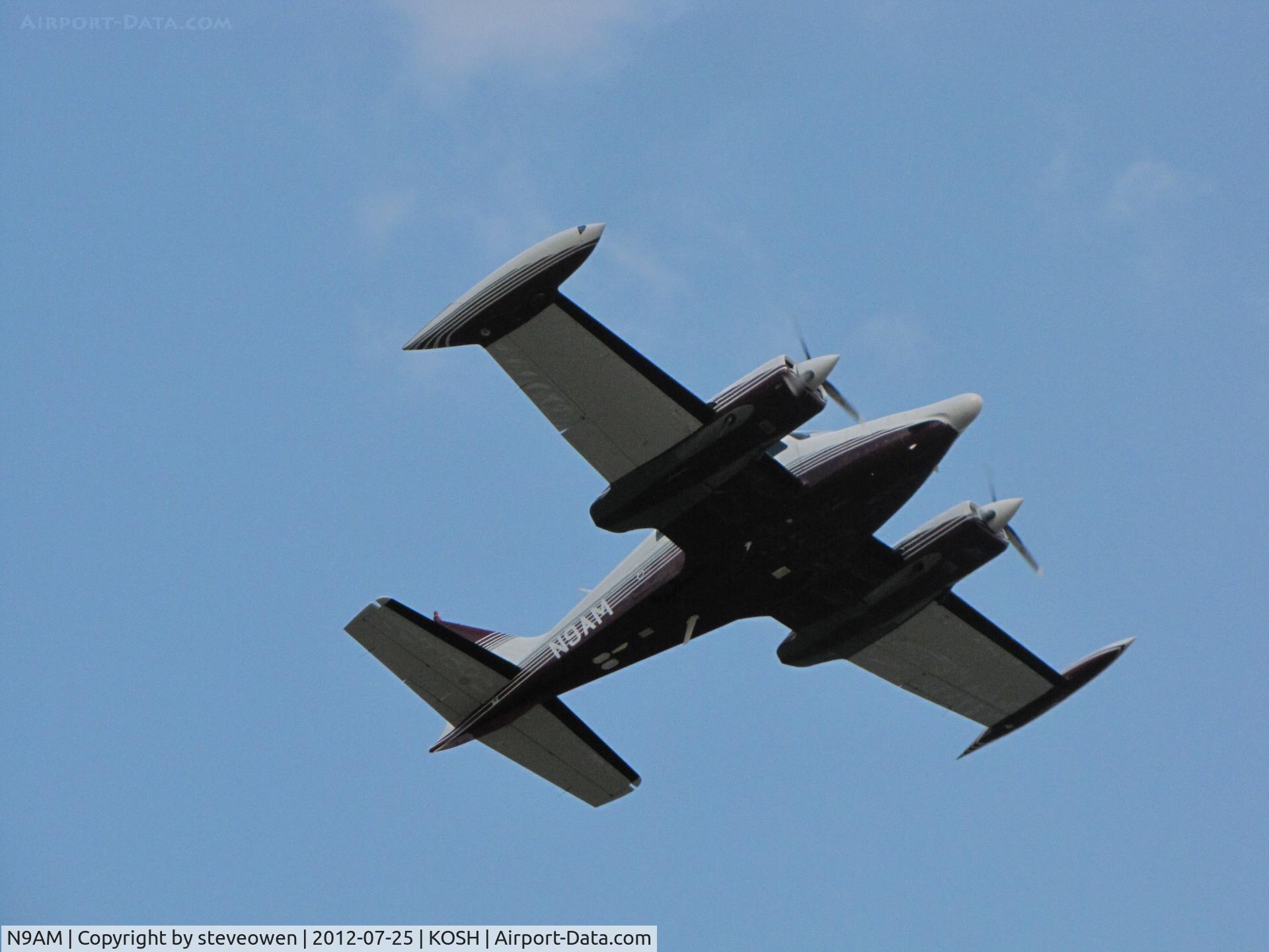 N9AM, 1969 Cessna 310P C/N 310P0196, departing Oshkosh