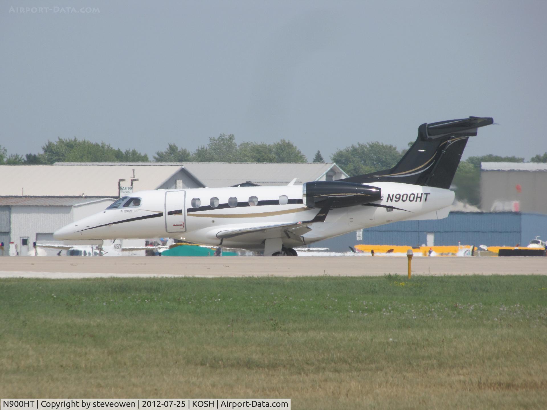 N900HT, 2011 Embraer EMB-505 Phenom 300 C/N 50500061, landing at Oshkosh
